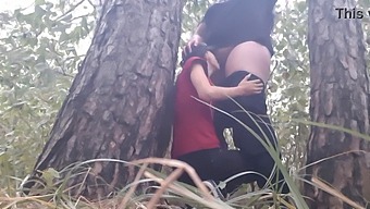 Lesbian Couple Enjoys Steamy Outdoor Orgasm Under Tree